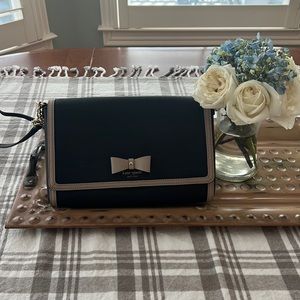 *kate spade adorable purse. Black & tan including a tan bow and gold trim*